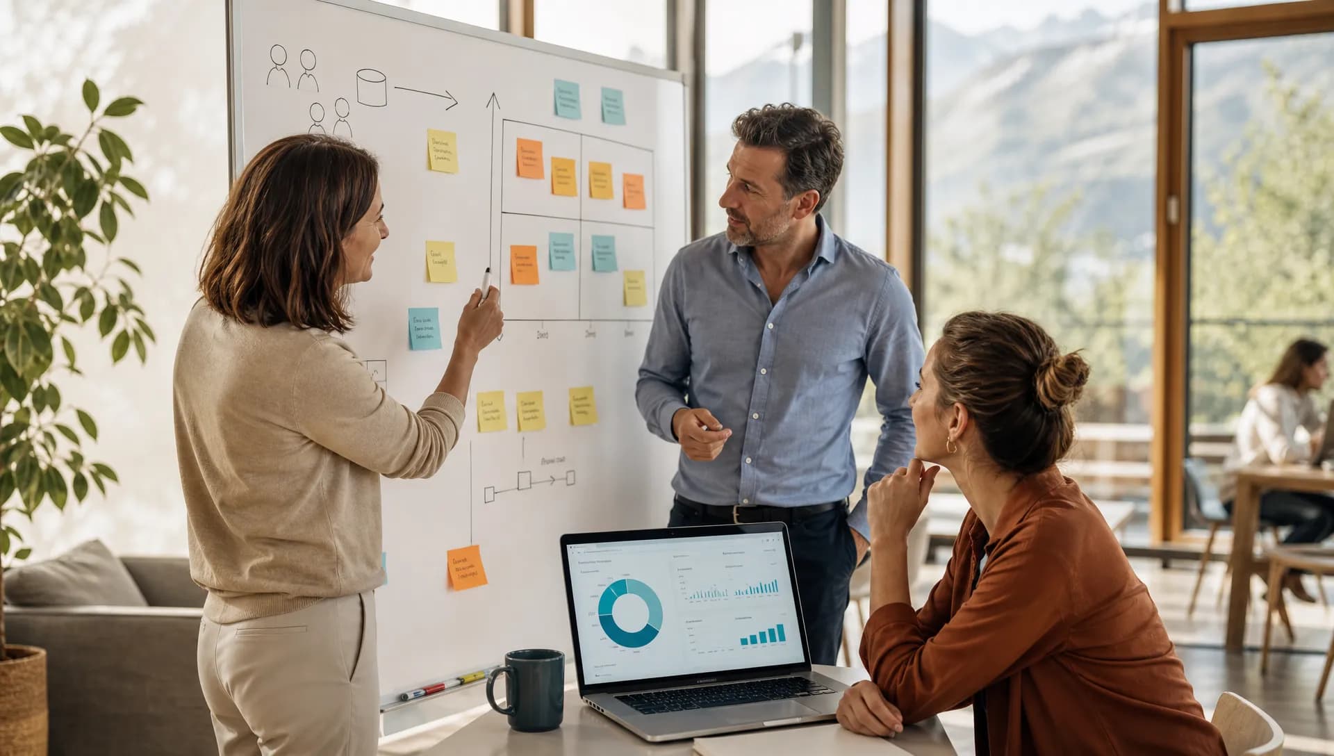 Réunion de cadrage IA dans une PME avec tableau de priorisation des cas d’usage et données métier.